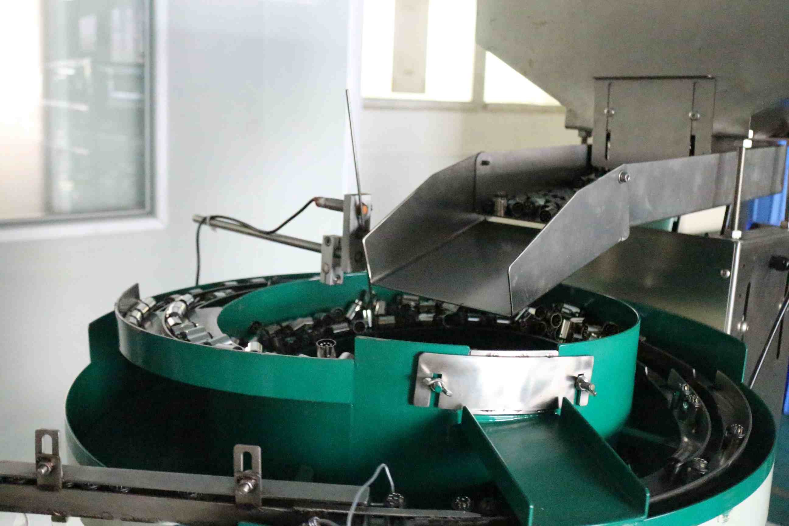 Connector production equipment